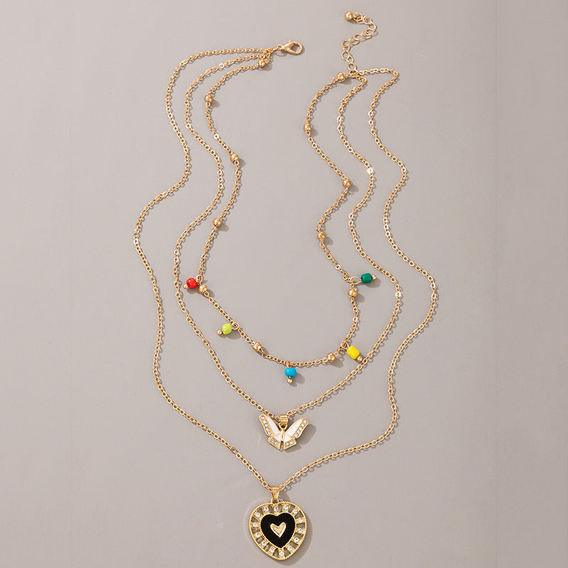 Multi-layer Colorful Rice Bead Dark Love Butterfly Pendant