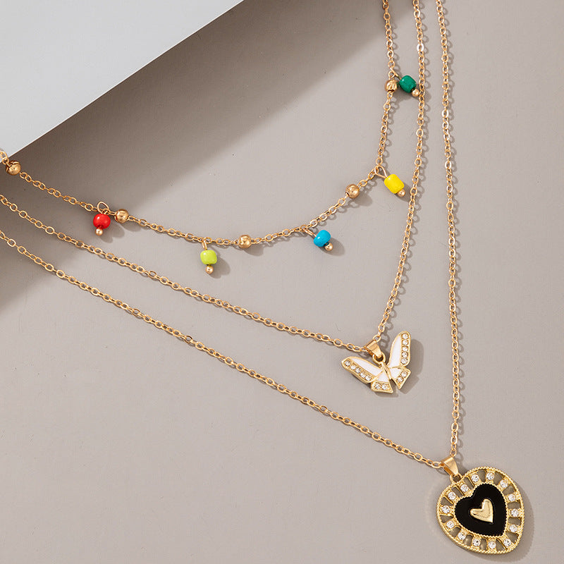 Multi-layer Colorful Rice Bead Dark Love Butterfly Pendant